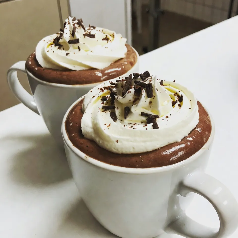 To make a delicious Baileys hot chocolate, you will need: - 2 cups whole milk - 1 cup heavy cream - 1/4 cup unsweetened cocoa powder - 1/2 cup semi-sweet chocolate chips - 1 tablespoon sugar (adjust to taste) - 1 teaspoon pure vanilla extract - 1/4 cup non-alcoholic Irish cream-flavored syrup - Whipped cream (for decadent topping) - Chocolate shavings or a light dusting of cocoa powder (for elegant garnish) You can swap some ingredients if needed. Use almond milk or oat milk for a dairy-free version. You can replace heavy cream with coconut cream for a lighter option. Try dark chocolate chips if you prefer a richer taste. If you want it sweeter, use flavored syrups like caramel or hazelnut instead of sugar. I love using brands that provide quality ingredients. For milk, I choose Horizon Organic for its creaminess. For chocolate chips, Guittard has a great semi-sweet option. If you want a good cocoa powder, try Ghirardelli. For the Irish cream-flavored syrup, Torani is a trusted brand. You can find whipped cream brands like Reddi-wip that are perfect for topping. {{ingredient_image_2}} Start by gathering your ingredients. You need whole milk, heavy cream, cocoa powder, chocolate chips, sugar, vanilla extract, and Irish cream syrup. In a medium saucepan, pour in the whole milk and heavy cream. Place it over medium heat. Heat the mixture until it steams, but do not let it boil. Boiling can change the texture and taste. Once you see steam, whisk in the unsweetened cocoa powder and sugar. Keep whisking until they blend well. The mixture should look smooth and rich. Next, add the semi-sweet chocolate chips. Whisk until they melt completely. This step gives your hot chocolate that velvety feel. After that, remove the saucepan from heat. Stir in the vanilla extract and Irish cream syrup. Mix well and taste it. If you want it sweeter, add more sugar. Temperature is key for this recipe. Heating the milk and cream too fast can cause a boil. You want a gentle heat to keep the hot chocolate smooth. Use a medium setting on your stove. Stir often to prevent any sticking. If your mixture starts to bubble, lower the heat. You want it steaming, not boiling. This will help keep the rich texture. To make your hot chocolate extra creamy, use whole milk and heavy cream. They add richness that low-fat milk cannot. The chocolate chips should be semi-sweet for a balanced flavor. If you like it sweeter, adjust the sugar. Topping it with whipped cream adds a nice texture and taste. For a fancy touch, use chocolate shavings or a dusting of cocoa powder on top. This makes it look great and taste even better. Enjoy your cozy treat! You can make your Baileys hot chocolate truly yours. Here are some easy ideas: - Flavors: Add a splash of peppermint extract for a minty twist. Try a hint of orange zest for a fruity kick. You can even mix in a spoonful of espresso for a mocha flavor. - Sweetness: Adjust the sugar to fit your taste. If you love it sweet, add more sugar. If you prefer less, cut back. - Toppings: Get creative with toppings! Use marshmallows, crushed candy canes, or even a drizzle of caramel. You can serve this drink for many events. Here are some fun ideas: - Cozy Nights: Make it on a cold night while watching a movie. Pair it with your favorite snacks for a perfect evening. - Holiday Gatherings: Serve at holiday parties. Set up a hot chocolate bar with toppings and let guests create their own treats. - Gifts: Fill mason jars with the dry ingredients. Attach a note with the recipe, and gift it to friends. To make the best Baileys hot chocolate, avoid these common errors: - Boiling the Milk: Always heat the milk slowly. Boiling can make it taste burnt and change the texture. - Not Whisking Enough: Whisk well to combine the cocoa and sugar. This ensures a smooth drink without lumps. - Skipping the Toppings: Don’t skip the whipped cream and garnishes. They add flavor and look beautiful. These tips will help you craft the perfect Baileys hot chocolate every time. Enjoy your cozy treat! Pro Tips Use High-Quality Chocolate: Opt for premium semi-sweet chocolate chips to enhance the flavor and richness of your hot chocolate. Adjust Sweetness to Taste: Start with the recommended sugar amount, but feel free to add more depending on your sweetness preference. Experiment with Flavors: Try adding a pinch of cinnamon or a drop of peppermint extract for a unique twist on the classic recipe. Serve Immediately: For the best experience, serve your hot chocolate right after making it while it's warm and creamy. {{image_4}} You can easily change the taste of Baileys Hot Chocolate. Try adding peppermint for a minty kick. Just add a few drops of peppermint extract. You can also mix in mocha flavors. Use a shot of espresso or some coffee. This will give your drink a rich coffee vibe. If you want a non-dairy version, use almond milk or oat milk. These choices still taste great and keep your drink creamy. Use coconut cream for a thicker texture. It adds a tropical twist too. You can also find non-dairy whipped cream for topping. For special occasions, you can add seasonal flavors. Try using pumpkin spice in the fall. It brings warmth and comfort on chilly days. During the holidays, you can add a splash of eggnog for a festive touch. This gives the drink a creamy, rich flavor. You can also top it with gingerbread crumbles for fun. To store leftovers, let your hot chocolate cool first. Pour it into an airtight container. Seal it well and keep it in the fridge. Use the leftovers within three days for the best taste. When you're ready to enjoy your hot chocolate again, pour it into a pot. Heat it on low until warm. Stir it often to keep it smooth. If you prefer, you can also use a microwave. Heat in short bursts, stirring in between. Most of the ingredients last a long time. Whole milk and heavy cream can last about a week in the fridge. Cocoa powder and sugar can sit in your pantry for months. Chocolate chips usually stay fresh for a year if stored right. Always check for any signs of spoilage before using. Baileys Hot Chocolate is a warm drink made with rich chocolate and Baileys Irish cream. This drink is smooth and creamy. It is a perfect treat for cold days. You blend hot chocolate with Baileys to get a sweet kick. The drink has layers of flavor that warm you up inside. Yes, you can enjoy Baileys Hot Chocolate without the alcohol. You can use a non-alcoholic Irish cream-flavored syrup instead. This gives you the same taste without the booze. The recipe I provided calls for this syrup. It adds a rich flavor without any alcohol. You can still enjoy the warm chocolate goodness! To make Baileys Hot Chocolate richer, use heavy cream in your mix. Heavy cream adds a thick, smooth texture. You can also add more chocolate chips for a deeper taste. Mixing in a little extra cocoa powder will enhance the chocolate flavor. Finally, top it with a generous amount of whipped cream for extra richness. We reviewed the key ingredients for Baileys Hot Chocolate and discussed substitutions. I shared step-by-step instructions to help you cook it just right, maintaining proper temperature and flavor. You learned tips for customizations and serving, avoiding common errors. We also explored fun variations and how to store your drink. So, whether you want a classic recipe or a festive twist, you can enjoy a warm treat. Using these insights, you can craft your perfect Baileys Hot Chocolate!